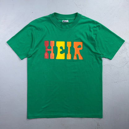 Heir 1980s VTG T Shirt Green Graphic Music Band Text Single Stitch 80s Hanes