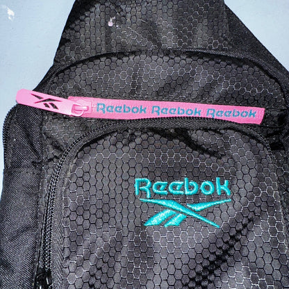 REEBOK Cosmos Crossbody Sling Bag Back Pack Black Pink Lightweight NWT