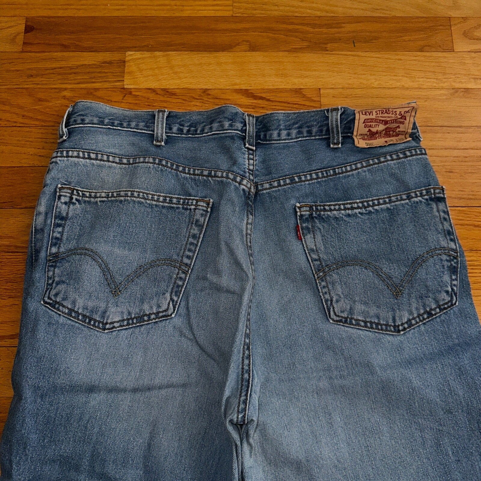 VTG Levi’s 550 Relaxed Fit Jeans Men’s 38x30 Blue Denim Pants 37x26 Hemmed