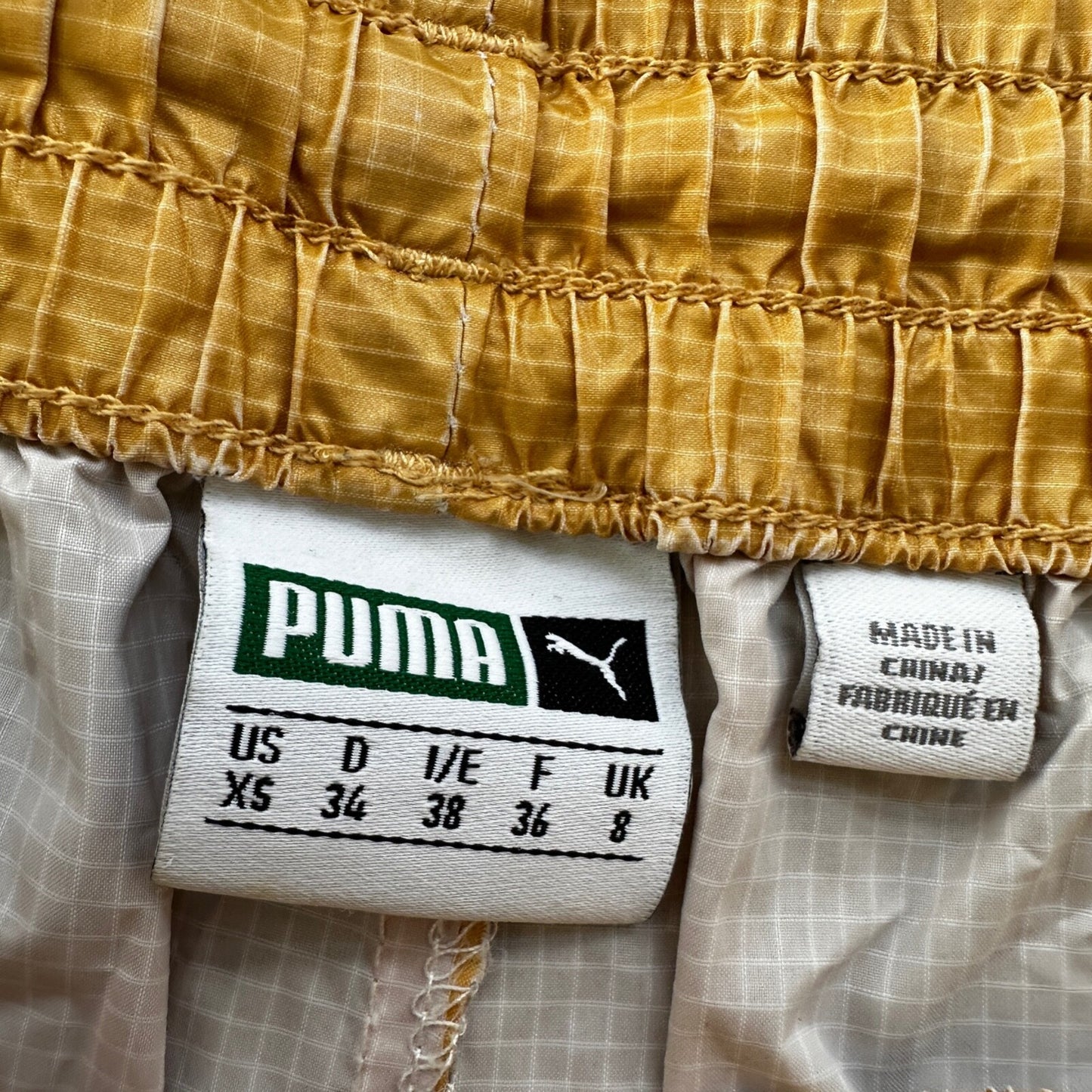 Women's Puma Workout Running Athletic Shorts Yellow Gold Black XS