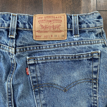 Vintage Levis 550 33x34 Denim Jeans Relaxed Fit USA Light Wash Blue Dad
