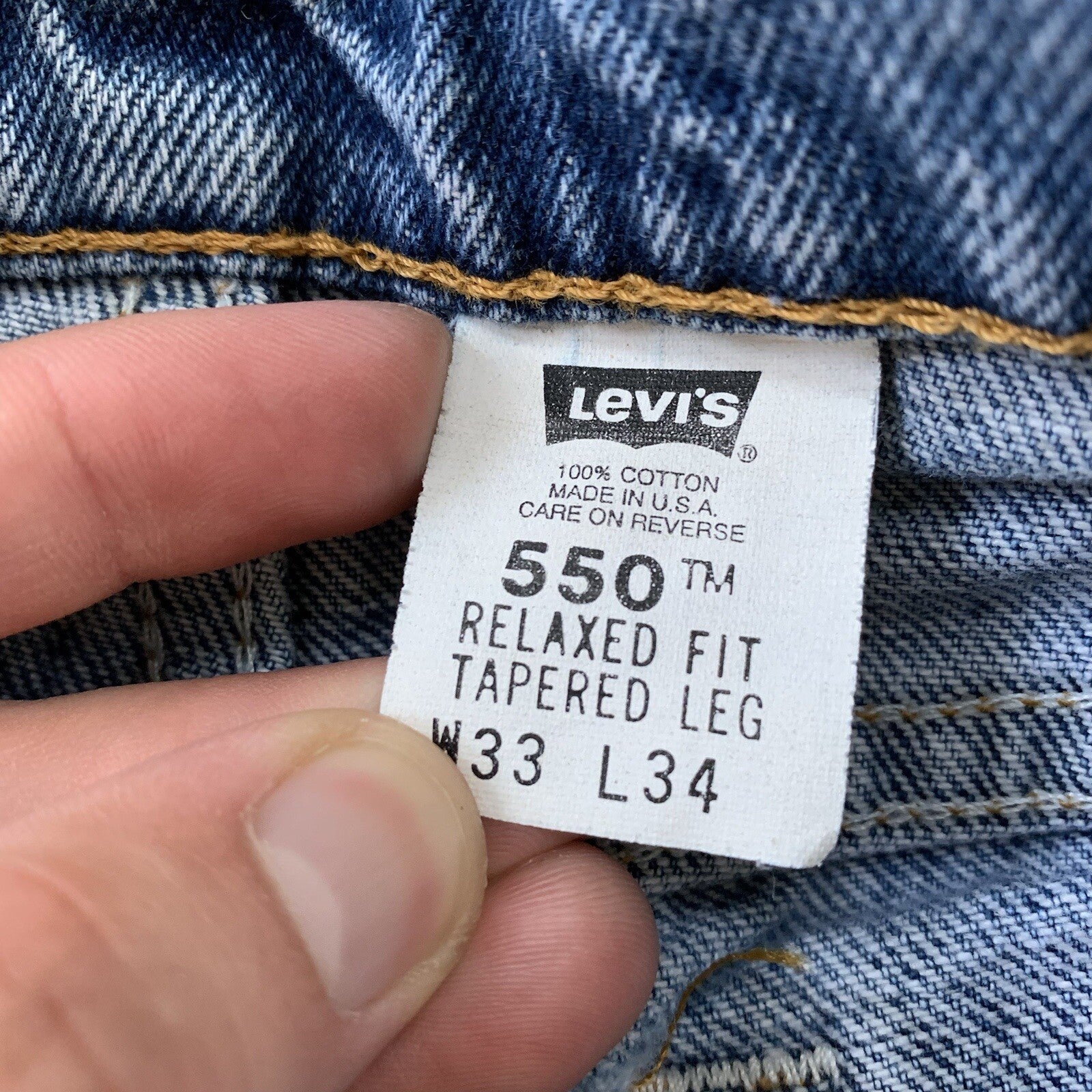 Vintage Levis 550 33x34 Denim Jeans Relaxed Fit USA Light Wash Blue Dad