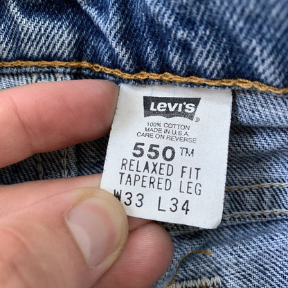 Vintage Levis 550 33x34 Denim Jeans Relaxed Fit USA Light Wash Blue Dad