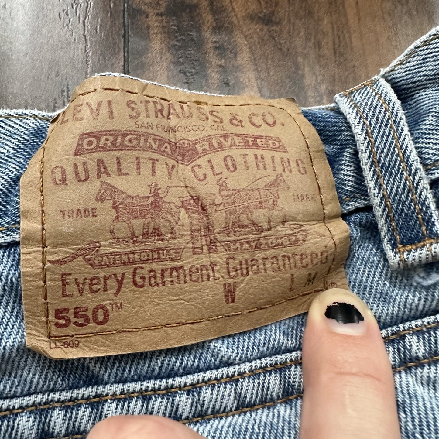 Levis 550 Jeans VTG Womens High Rise Light Wash Relaxed 90s USA 31x29