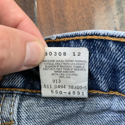 Vintage Levis 550 33x34 Denim Jeans Relaxed Fit USA Light Wash Blue Dad